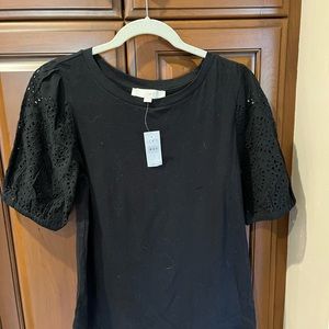 Black top. Loft. Eyelet sleeves, size small. Never worn with tags